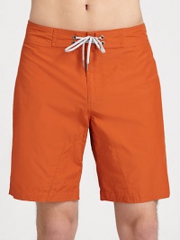 Engineered board shorts, perfect for traipsing the streets or surfing the waves, set in quick drying cotton-nylon.Drawstring waistZip flyBack welt pocketsInseam, about 855% cotton/45% nylonMachine washImported