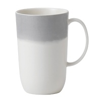 A watercolor wash of gradient gray migrates toward a warm neutral center to create an organic ombre effect on this durable, adaptable mug from Vera Wang. A watercolor wash of gradient gray migrates toward a warm neutral center to create an organic ombre effect on this durable, adaptable mug from Vera Wang.