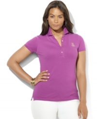 Rendered in soft stretch cotton mesh, Lauren Ralph Lauren's plus size classic polo shirt is designed with a chic five-button placket and accented with an embroidered crest. Rendered in soft stretch cotton mesh, Lauren Ralph Lauren's plus size classic polo shirt is designed with a chic five-button placket and accented with an embroidered crest.