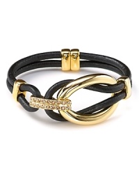 T Tahari makes a mixed material statement with this gold-plate and leather bracelet, boasting a bold contrast of tone and texture. T Tahari makes a mixed material statement with this gold-plate and leather bracelet, boasting a bold contrast of tone and texture.