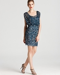 Aidan Mattox's sparkling sequin dress offers a duo of dazzling options--wear it off-the-shoulder if you're in the mood to show some skin. Aidan Mattox's sparkling sequin dress offers a duo of dazzling options--wear it off-the-shoulder if you're in the mood to show some skin.