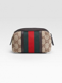 Small cosmetic case in GG fabric with web detail, leather trim, and metal hardware.Zip-top closure One inside open pocket Fully lined 6W X 4H X 2½D Made in Italy Small cosmetic case in GG fabric with web detail, leather trim, and metal hardware.Zip-top closure One inside open pocket Fully lined 6W X 4H X 2½D Made in Italy