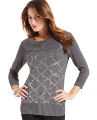 A glittery pattern gives this cowlneck sweater from AGB an argyle-style effect. A glittery pattern gives this cowlneck sweater from AGB an argyle-style effect.