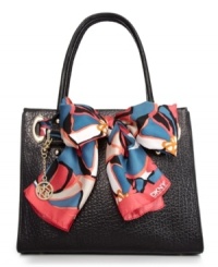 A timeless style that exudes classic, feminine appeal. This savvy shopper from DKNY features a luxurious silk scarf woven through goldtone O-shaped rings at top of bag. A designer charm adds the perfect finishing touch. A timeless style that exudes classic, feminine appeal. This savvy shopper from DKNY features a luxurious silk scarf woven through goldtone O-shaped rings at top of bag. A designer charm adds the perfect finishing touch.