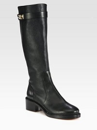 Smooth and pebbled leather combine in this equestrian-inspired design, impeccably crafted in Italy. Stacked heel, 2 (50mm)Shaft, 14¼Leg circumference, 13¼Leather upperSide zipLeather lining and solePadded insoleMade in Italy Smooth and pebbled leather combine in this equestrian-inspired design, impeccably crafted in Italy. Stacked heel, 2 (50mm)Shaft, 14¼Leg circumference, 13¼Leather upperSide zipLeather lining and solePadded insoleMade in Italy