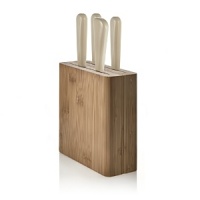 Alessi's knife block is designed to store cheese knives from the Milky Way Minor collection. Knives not included.