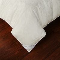 This medium down Sferra duvet is designed to cocoon you in sweet dreams. The Sferra Down Collection boasts an amazing variety of down duvets and sleeping pillows. Carefully constructed of down clusters, which interlock and trap air to keep you warm, but also have the remarkable ability to keep you comfortable, Sferra down offers varying levels of fill power to customize the perfect sleeping experience. A measure of efficiency, the higher the fill power number, the better the down and the greater its insulating value. With a weight and a loft for everyone, one will be just right for you. This medium down Sferra duvet is designed to cocoon you in sweet dreams. The Sferra Down Collection boasts an amazing variety of down duvets and sleeping pillows. Carefully constructed of down clusters, which interlock and trap air to keep you warm, but also have the remarkable ability to keep you comfortable, Sferra down offers varying levels of fill power to customize the perfect sleeping experience. A measure of efficiency, the higher the fill power number, the better the down and the greater its insulating value. With a weight and a loft for everyone, one will be just right for you.