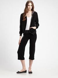 THE LOOKHoodie Front zip closure with decorative pull Long sleeves with elastic, ribbed cuffs Split kangaroo pocket Ribbed elastic hemTHE FITContemporary fit About 22 ½ from shoulder to hemTHE MATERIAL80% cotton/20% polyesterCARE & ORIGINMachine wash Made in USA THE LOOKHoodie Front zip closure with decorative pull Long sleeves with elastic, ribbed cuffs Split kangaroo pocket Ribbed elastic hemTHE FITContemporary fit About 22 ½ from shoulder to hemTHE MATERIAL80% cotton/20% polyesterCARE & ORIGINMachine wash Made in USA