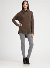 A soft, slouchy take on the classic turtleneck pullover, crafted from a luxe blend of wool and cashmere.Draped turtleneckDropped shouldersLong sleevesHi-lo hem59% wool/25% cashmere/16% polyesterDry cleanMade in ItalyModel shown is 5'11 (180cm) wearing US size Small. A soft, slouchy take on the classic turtleneck pullover, crafted from a luxe blend of wool and cashmere.Draped turtleneckDropped shouldersLong sleevesHi-lo hem59% wool/25% cashmere/16% polyesterDry cleanMade in ItalyModel shown is 5'11 (180cm) wearing US size Small.