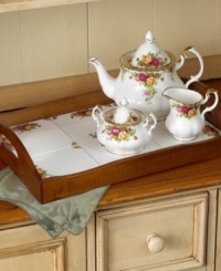 This popular bone china pattern surrounds blooming sprays of colorful English roses with hand-applied bands of 22K gold. This popular bone china pattern surrounds blooming sprays of colorful English roses with hand-applied bands of 22K gold.