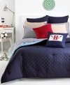 An American dream! Rest in the lap of luxury with this Midnight Hilfiger Prep comforter featuring a patriotic blue landscape with red accents. The unique combination of allover diamond quilting and signature ribbon elements reflect classic Tommy Hilfiger style.