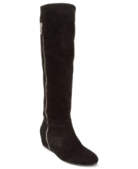 Sleek sophistication. With an exposed outside zipper and an elastic gore at the top of the shaft, BCBGeneration's Isanna wide calf wedge boots have style covered. Sleek sophistication. With an exposed outside zipper and an elastic gore at the top of the shaft, BCBGeneration's Isanna wide calf wedge boots have style covered.