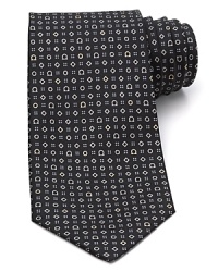 A neat and fancy gancini pattern, on a classic Salvatore Ferragamo silk tie. A neat and fancy gancini pattern, on a classic Salvatore Ferragamo silk tie.