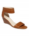 Here's the skinny: the Packpunch wedge sandals by Nine West lend sophistication to pants, capris and skirts alike with their slim profile and stacked heel.