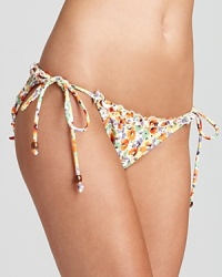 Shoshanna makes florals feel fresh, feminine and ready for a dip in the deep end. With ruffled detailing, this string bikini is a perfect poolside option for the girlie girl. Shoshanna makes florals feel fresh, feminine and ready for a dip in the deep end. With ruffled detailing, this string bikini is a perfect poolside option for the girlie girl.