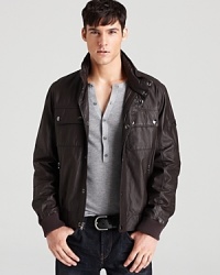 You don't need to fly an F-16 to rock this fine leather bomber. With an upscale edge, Michael Kors keeps your look hip and authentic. You don't need to fly an F-16 to rock this fine leather bomber. With an upscale edge, Michael Kors keeps your look hip and authentic.