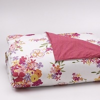 Change your bedroom look as you change your mood. The reversible duvet features a garden of flowers on one side and a vibrant fuschia hue on the other.