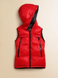 A reversible, sleeveless vest in shiny nylon with zippered pockets for style and comfort.Attached hoodSleevelessFront zipZippered side pocketsPolyesterDown fillMachine washImported A reversible, sleeveless vest in shiny nylon with zippered pockets for style and comfort.Attached hoodSleevelessFront zipZippered side pocketsPolyesterDown fillMachine washImported