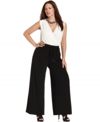 Be a style star in Spense's sleeveless plus size jumpsuit, cinched by a drawstring waist. Be a style star in Spense's sleeveless plus size jumpsuit, cinched by a drawstring waist.