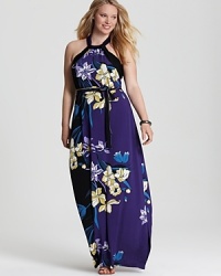 Graphic florals punctuate the floor-sweeping silhouette of this Tahari Woman Plus maxi dress. Slip the style under a leather jacket for a modern take on femininity. Graphic florals punctuate the floor-sweeping silhouette of this Tahari Woman Plus maxi dress. Slip the style under a leather jacket for a modern take on femininity.