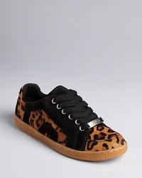 Exotic style in a familiar, casual silhouette makes for a wearable sneaker, with luxurious calf hair and suede uppers; from Juicy Couture. Exotic style in a familiar, casual silhouette makes for a wearable sneaker, with luxurious calf hair and suede uppers; from Juicy Couture.