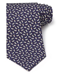 Salvatore Ferragamo is a close second in the man's best friend department, constantly furnishing you with refined designs that measure up to your impeccable style. Add the playful and charming dog print tie for a dose of wit at the office and dressed-up events over the weekend. Salvatore Ferragamo is a close second in the man's best friend department, constantly furnishing you with refined designs that measure up to your impeccable style. Add the playful and charming dog print tie for a dose of wit at the office and dressed-up events over the weekend.