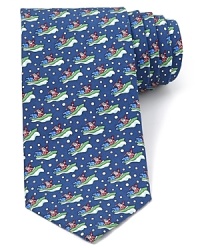 Santa sheds the sled for a rollicking speedboat adventure on this lighthearted tie design from Vineyard Vines. Santa sheds the sled for a rollicking speedboat adventure on this lighthearted tie design from Vineyard Vines.