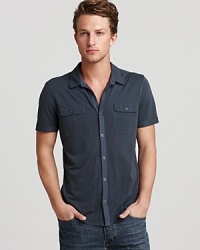 Plush silk is blended with fine pima cotton for a decadent softness in this solid, slim-fitting sport shirt, designed with two chest pockets for even more modern appeal. Plush silk is blended with fine pima cotton for a decadent softness in this solid, slim-fitting sport shirt, designed with two chest pockets for even more modern appeal.