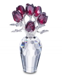 Add a touch of romance to your home with the Swarovski Red Roses. Seven ruby-red roses, crafted of sparkling Swarovski crystal with rhodium stems are set in a multi-faceted vase. 2-5/8 H x 1-5/8 D. Add a touch of romance to your home with the Swarovski Red Roses. Seven ruby-red roses, crafted of sparkling Swarovski crystal with rhodium stems are set in a multi-faceted vase. 2-5/8 H x 1-5/8 D.