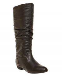 Find your beat with this wear-everywhere design by Steve Madden. With a low, stacked heel and sexy, ruched shaft, the Candence boots will be an instant favorite.