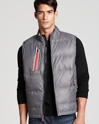 Keep your arms free for a full swing while maintaining an even temperature with this warm, down-filled vest from Zero Restriction, the perfect antidote for an extra brisk back nine. Keep your arms free for a full swing while maintaining an even temperature with this warm, down-filled vest from Zero Restriction, the perfect antidote for an extra brisk back nine.