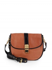 THE LOOKRemovable, adjustable contrast crossbody strapSmooth leather body with contrast center strapFlap with flip-lock buckle closureContrast expandable side zip gussets with logo pullsContrast logo-embossed leather detail at backThree zip compartmentsThree inside open pocketsOne inside zip pocketKey ring clipInside logo detailTHE MEASUREMENTAdjustable crossbody strap THE LOOKRemovable, adjustable contrast crossbody strapSmooth leather body with contrast center strapFlap with flip-lock buckle closureContrast expandable side zip gussets with logo pullsContrast logo-embossed leather detail at backThree zip compartmentsThree inside open pocketsOne inside zip pocketKey ring clipInside logo detailTHE MEASUREMENTAdjustable crossbody strap