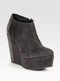 Suede ankle boot in a modern, two-tone design with a self-covered wedge and an exposed side zipper. Self-covered wedge, 5 (125mm)Covered platform, 1½ (40mm)Compares to a 3½ heel (90mm)Suede upperSide zipperLeather liningRubber solePadded insoleMade in ItalyOUR FIT MODEL RECOMMENDS ordering one size up as this style runs small. Suede ankle boot in a modern, two-tone design with a self-covered wedge and an exposed side zipper. Self-covered wedge, 5 (125mm)Covered platform, 1½ (40mm)Compares to a 3½ heel (90mm)Suede upperSide zipperLeather liningRubber solePadded insoleMade in ItalyOUR FIT MODEL RECOMMENDS ordering one size up as this style runs small.