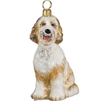 Mouth blown and hand painted by some of the finest artists in Poland, this Goldendoodle ornament is a favorite for hanging on the tree. This collection has been taken to a whole new level in detail, uniqueness and artistic direction. Mouth blown and hand painted by some of the finest artists in Poland, this Goldendoodle ornament is a favorite for hanging on the tree. This collection has been taken to a whole new level in detail, uniqueness and artistic direction.