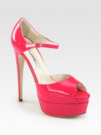 Have maximum impact wearing this elevated patent leather silhouette in a high-voltage hue. Self-covered heel, 6 (150mm)Covered platform, 1¼ (30mm)Compares to a 4¾ heel (120mm)Patent leather upperAdjustable ankle strapLeather lining and solePadded insoleMade in Italy Have maximum impact wearing this elevated patent leather silhouette in a high-voltage hue. Self-covered heel, 6 (150mm)Covered platform, 1¼ (30mm)Compares to a 4¾ heel (120mm)Patent leather upperAdjustable ankle strapLeather lining and solePadded insoleMade in Italy