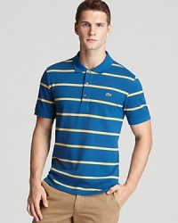 Tailored for a classic fit to provide reliable comfort wear after wear, this polo fortifies your collection of essential basics with a handsome stripe pattern. Tailored for a classic fit to provide reliable comfort wear after wear, this polo fortifies your collection of essential basics with a handsome stripe pattern.