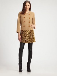 A faux fur hemline panel lends this structural wool style an exotic touch.Jewel necklineDouble-breasted button frontSide slash pocketsThree-quarter sleeves with vented cuffsFaux fur hemline panelFully linedAbout 33 from shoulder to hemWoolDry cleanMade in USA of imported fabricModel shown is 5'10 (177cm) wearing US size Small. A faux fur hemline panel lends this structural wool style an exotic touch.Jewel necklineDouble-breasted button frontSide slash pocketsThree-quarter sleeves with vented cuffsFaux fur hemline panelFully linedAbout 33 from shoulder to hemWoolDry cleanMade in USA of imported fabricModel shown is 5'10 (177cm) wearing US size Small.