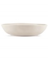 Find stylish versatility in the organic shape and matte-glazed finish of the large Casual Luxe serving bowl from Donna Karan by Lenox. Durable stoneware in a soft pearl hue is an ideal host for everyday meals and a natural go-to for entertaining.