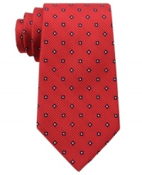 A bold pattern make this Tommy Hilfiger silk tie pop for a look that's sure to get you noticed. A bold pattern make this Tommy Hilfiger silk tie pop for a look that's sure to get you noticed.