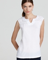 Delicate eyelet embellishment lends a feminine finish to this Three Dots cotton top. Pair with pastel denim for sweet summer style. Delicate eyelet embellishment lends a feminine finish to this Three Dots cotton top. Pair with pastel denim for sweet summer style.