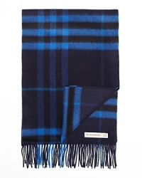 Burberry's oversized check adorns this luxe cashmere scarf. Burberry's oversized check adorns this luxe cashmere scarf.