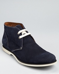 Crafted in fine Italian leather, this chukka cuts a lean profile. John Varvatos' touch is evident in details like subtle topstitching and weather and a sneaker-inspired contrast rubber sole. Crafted in fine Italian leather, this chukka cuts a lean profile. John Varvatos' touch is evident in details like subtle topstitching and weather and a sneaker-inspired contrast rubber sole.