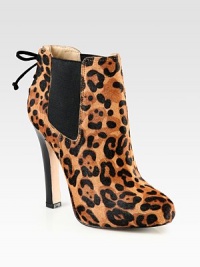 Luxe leopard-print calf hair forms this towering silhouette with an unexpected lace-up suede back. Leather-covered heel, 4¾ (120mm)Hidden platform, 1 (25mm)Compares to a 3¾ heel (95mm)Leopard-print calf hair upper with side elastic gores and suede trimPull-on styleLeather liningLeather and rubber solePadded insoleImported Luxe leopard-print calf hair forms this towering silhouette with an unexpected lace-up suede back. Leather-covered heel, 4¾ (120mm)Hidden platform, 1 (25mm)Compares to a 3¾ heel (95mm)Leopard-print calf hair upper with side elastic gores and suede trimPull-on styleLeather liningLeather and rubber solePadded insoleImported