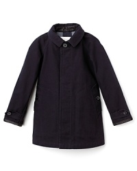 Burberry's classic cotton trench, rendered for your little guy with leather trim at the collar and cuff and subtle stitching accents throughout the piece. Burberry's classic cotton trench, rendered for your little guy with leather trim at the collar and cuff and subtle stitching accents throughout the piece.