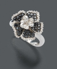Take a departure from the ordinary. This diamond ring stands apart from the rest by featuring flower petals shimmering unexpectedly with round-cut black diamonds (1/3 ct. t.w.) and accents of round-cut white diamond (1/5 ct. t.w.). Ring crafted in sterling silver. Size 7. Take a departure from the ordinary. This diamond ring stands apart from the rest by featuring flower petals shimmering unexpectedly with round-cut black diamonds (1/3 ct. t.w.) and accents of round-cut white diamond (1/5 ct. t.w.). Ring crafted in sterling silver. Size 7.