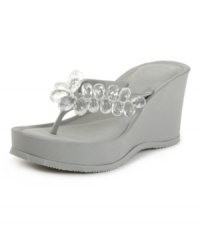 Sparkle back at the sun with the Sarra flip flops by BCBGeneration. Faceted baubles at the straps catch the light for summer-loving style. Sparkle back at the sun with the Sarra flip flops by BCBGeneration. Faceted baubles at the straps catch the light for summer-loving style.