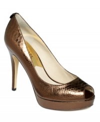 Fundamentally fashionable. Crafted in embossed leather, the York platform pumps by MICHAEL Michael Kors were made for make-it-or-break style situations. Fundamentally fashionable. Crafted in embossed leather, the York platform pumps by MICHAEL Michael Kors were made for make-it-or-break style situations.