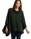 THE LOOKTextured waffle knit constructionPoncho-inspired designCowlneckRibbed knit trimTHE FITAbout 37 from shoulder to hemTHE MATERIALMerino wool/cashmereCARE & ORIGINHand washImportedModel shown is 5'9½ (176cm) wearing US size Small. 
