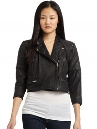 THE LOOKSmooth leather with quilted seamsStand collar with snap tab detailAsymmetric flaps with snap closuresAsymmetric front zip closureVertical and horizontal zip pocketsThree-quarter length sleeves with zip cuffsZip-out removable sleeves convert jacket to vestKnit backTHE FITAbout 11 from shoulder to hemTHE MATERIALLeatherSecond fabric: cottonFully linedCARE & ORIGINClean by leather specialistImportedModel shown is THE LOOKSmooth leather with quilted seamsStand collar with snap tab detailAsymmetric flaps with snap closuresAsymmetric front zip closureVertical and horizontal zip pocketsThree-quarter length sleeves with zip cuffsZip-out removable sleeves convert jacket to vestKnit backTHE FITAbout 11 from shoulder to hemTHE MATERIALLeatherSecond fabric: cottonFully linedCARE & ORIGINClean by leather specialistImportedModel shown is