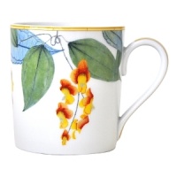 Adapted from botanical drawings of gardens in Mumbai, India, where an abundance of rare plant species grow, precisely detailed floral and vegetal illustrations adorn this fine porcelain mug from Bernardaud. It's edged with a rattan trompe l'oeil pattern reminiscent of popular Indian furniture designs. Adapted from botanical drawings of gardens in Mumbai, India, where an abundance of rare plant species grow, precisely detailed floral and vegetal illustrations adorn this fine porcelain mug from Bernardaud. It's edged with a rattan trompe l'oeil pattern reminiscent of popular Indian furniture designs.